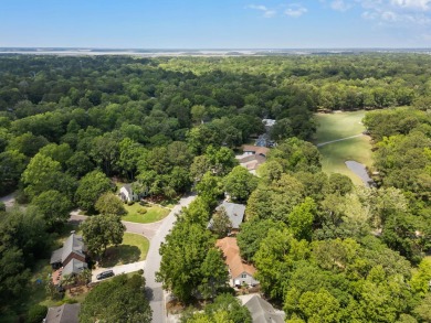 This beautifully updated charmer boasts dual primary suites -- on Snee Farm Country Club in South Carolina - for sale on GolfHomes.com, golf home, golf lot