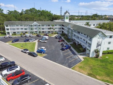 Breezy, bright & Beautiful.  This 3rd-floor condo is the perfect on On Top Of The World Golf Course in Florida - for sale on GolfHomes.com, golf home, golf lot