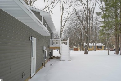 Discover your dream home! This beautifully renovated property on Twin Birch Golf Club in Michigan - for sale on GolfHomes.com, golf home, golf lot