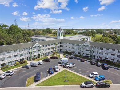 Breezy, bright & Beautiful.  This 3rd-floor condo is the perfect on On Top Of The World Golf Course in Florida - for sale on GolfHomes.com, golf home, golf lot