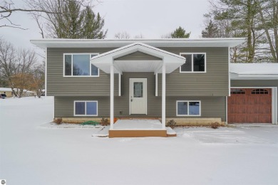 Discover your dream home! This beautifully renovated property on Twin Birch Golf Club in Michigan - for sale on GolfHomes.com, golf home, golf lot