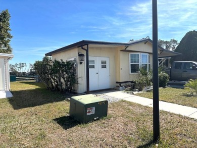 COME LOOK AT THIS UPDATED 2-BEDROOM, 1.5-BATHROOM HOME IN on Anglers Green Golf Course in Florida - for sale on GolfHomes.com, golf home, golf lot