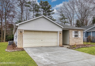 Beautifully remodeled, move-in-ready home located in one of the on Greenbriar Woodlands in New Jersey - for sale on GolfHomes.com, golf home, golf lot