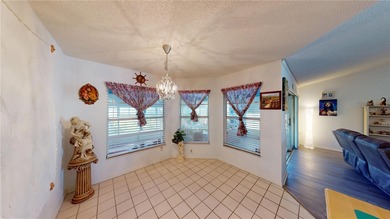 Make sure to check out the Virtual Tour for a 3D Model w/ on Meadow Oaks Golf and Country Club in Florida - for sale on GolfHomes.com, golf home, golf lot