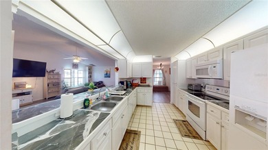 Make sure to check out the Virtual Tour for a 3D Model w/ on Meadow Oaks Golf and Country Club in Florida - for sale on GolfHomes.com, golf home, golf lot