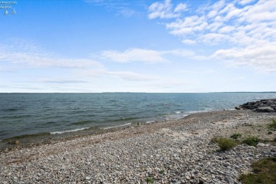 Are you interested in a home with BREATHTAKING LAKE VIEWS? This on Catawba Island Club in Ohio - for sale on GolfHomes.com, golf home, golf lot