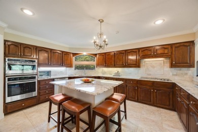 This wonderful property located in The Shores is situated on the on The Shores Country Club in Texas - for sale on GolfHomes.com, golf home, golf lot