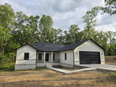 PRICED TO SELL! This property sounds absolutely fantastic! With on Diamondhead Golf and Country Club in Arkansas - for sale on GolfHomes.com, golf home, golf lot