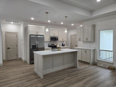 PRICED TO SELL! This property sounds absolutely fantastic! With on Diamondhead Golf and Country Club in Arkansas - for sale on GolfHomes.com, golf home, golf lot