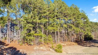 This 0.50-acre lot, one of the largest in Anderson Creek Club on Anderson Creek Golf Club in North Carolina - for sale on GolfHomes.com, golf home, golf lot
