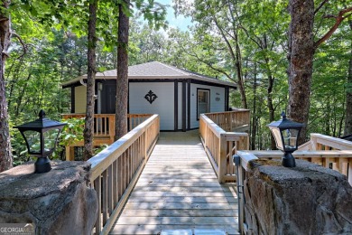 Feels like a treehouse. Perfect starter or vacation rental on Sky Valley Resort and Country Club in Georgia - for sale on GolfHomes.com, golf home, golf lot