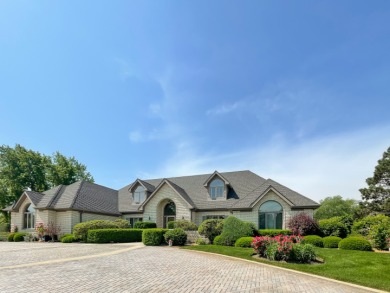 Note the amazing curb appeal with this fine home's all brick on St. Andrews Golf and Country Club in Illinois - for sale on GolfHomes.com, golf home, golf lot