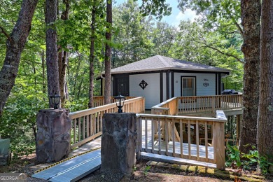 Feels like a treehouse. Perfect starter or vacation rental on Sky Valley Resort and Country Club in Georgia - for sale on GolfHomes.com, golf home, golf lot