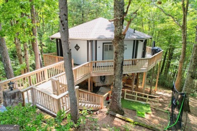 Feels like a treehouse. Perfect starter or vacation rental on Sky Valley Resort and Country Club in Georgia - for sale on GolfHomes.com, golf home, golf lot