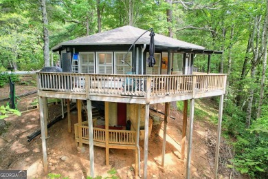 Feels like a treehouse. Perfect starter or vacation rental on Sky Valley Resort and Country Club in Georgia - for sale on GolfHomes.com, golf home, golf lot