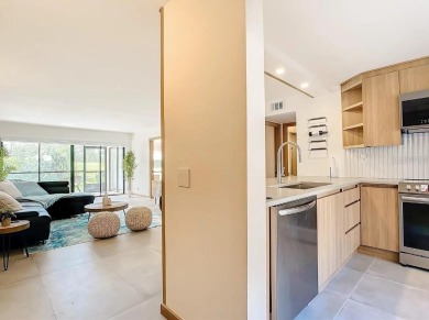 Exquisite FULLY FURNISHED 2-Bed/2-Bath 1st floor Condo Just on Isla Del Sol Yacht and Country Club in Florida - for sale on GolfHomes.com, golf home, golf lot
