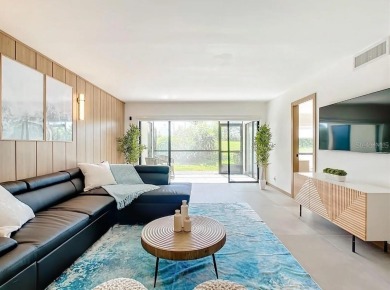 Exquisite FULLY FURNISHED 2-Bed/2-Bath 1st floor Condo Just on Isla Del Sol Yacht and Country Club in Florida - for sale on GolfHomes.com, golf home, golf lot