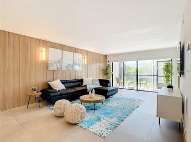 Exquisite FULLY FURNISHED 2-Bed/2-Bath 1st floor Condo Just on Isla Del Sol Yacht and Country Club in Florida - for sale on GolfHomes.com, golf home, golf lot
