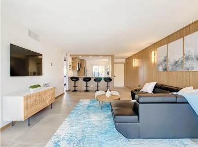 Exquisite FULLY FURNISHED 2-Bed/2-Bath 1st floor Condo Just on Isla Del Sol Yacht and Country Club in Florida - for sale on GolfHomes.com, golf home, golf lot