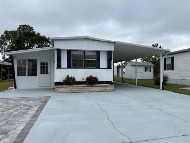 Under contract-accepting backup offers. Welcome to Caribbean on Apollo Beach Golf and Sea Club in Florida - for sale on GolfHomes.com, golf home, golf lot