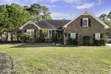 Possibly even 5 bedrooms in this over 2600sqft brick home in the on Masonboro Country Club in North Carolina - for sale on GolfHomes.com, golf home, golf lot