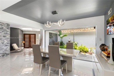 Welcome to this beautifully designed single-family home that on Woodlands Country Club in Florida - for sale on GolfHomes.com, golf home, golf lot