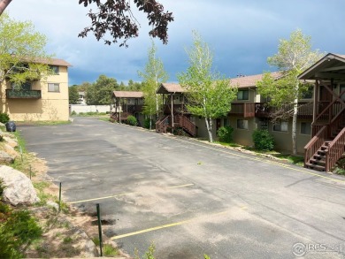 Mountain Views & Modern Comfort 950 Big Thompson Ave. Unit #2142 on Lake Estes Golf Course in Colorado - for sale on GolfHomes.com, golf home, golf lot