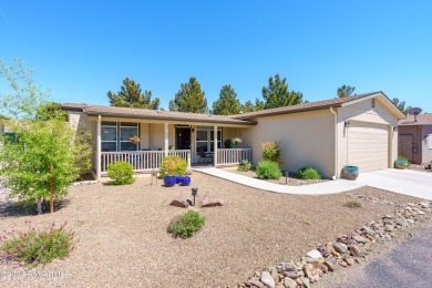 Upgraded features, beautiful, bright, and absolutely charming on Pine Shadows Golf Course in Arizona - for sale on GolfHomes.com, golf home, golf lot