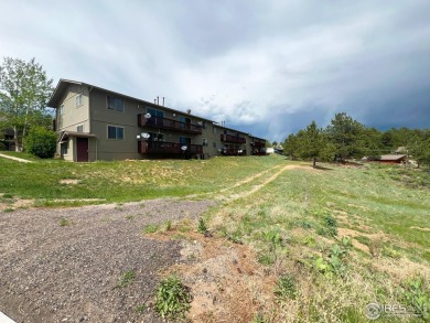 Mountain Views & Modern Comfort 950 Big Thompson Ave. Unit #2142 on Lake Estes Golf Course in Colorado - for sale on GolfHomes.com, golf home, golf lot