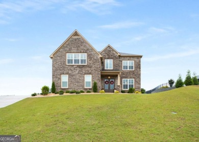 Located in Lakeview-Heron Bay's only gated section-this elegant on Canongate At Heron Bay in Georgia - for sale on GolfHomes.com, golf home, golf lot
