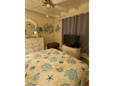 Welcome to The Keys Escape! This fully renovated two bedroom/two on Key Colony Beach Golf Course in Florida - for sale on GolfHomes.com, golf home, golf lot