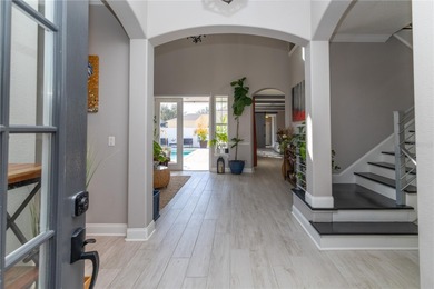 Fall in love with this stunning custom pool home featuring a on Harmony Golf Preserve in Florida - for sale on GolfHomes.com, golf home, golf lot