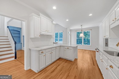 Welcome to this exquisite John Weiland-designed estate, where on Reunion Golf Club in Georgia - for sale on GolfHomes.com, golf home, golf lot