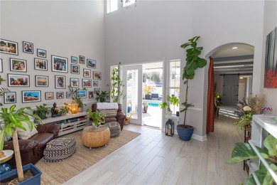 Fall in love with this stunning custom pool home featuring a on Harmony Golf Preserve in Florida - for sale on GolfHomes.com, golf home, golf lot