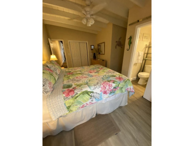 Welcome to The Keys Escape! This fully renovated two bedroom/two on Key Colony Beach Golf Course in Florida - for sale on GolfHomes.com, golf home, golf lot