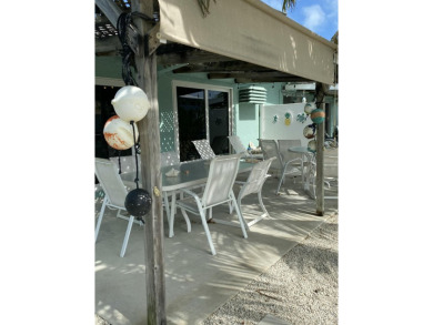 Welcome to The Keys Escape! This fully renovated two bedroom/two on Key Colony Beach Golf Course in Florida - for sale on GolfHomes.com, golf home, golf lot