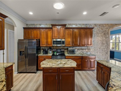 One or more photo(s) has been virtually staged. WATERFRONT on Lake Ashton Golf Club in Florida - for sale on GolfHomes.com, golf home, golf lot