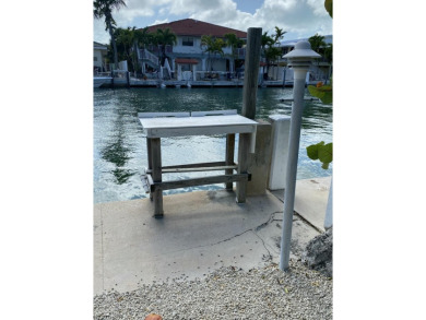Welcome to The Keys Escape! This fully renovated two bedroom/two on Key Colony Beach Golf Course in Florida - for sale on GolfHomes.com, golf home, golf lot