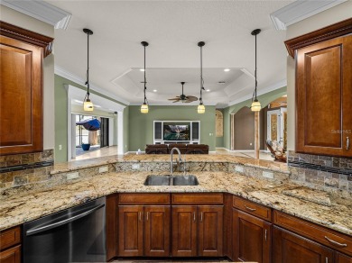 One or more photo(s) has been virtually staged. WATERFRONT on Lake Ashton Golf Club in Florida - for sale on GolfHomes.com, golf home, golf lot