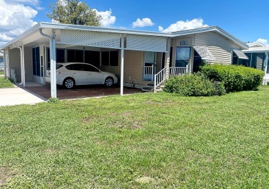 A corner lot home in a well-maintained, professionally managed on Lakes at Leesburg Golf Course in Florida - for sale on GolfHomes.com, golf home, golf lot