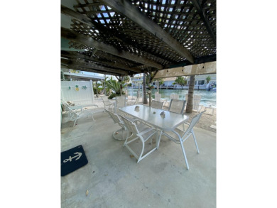 Welcome to The Keys Escape! This fully renovated two bedroom/two on Key Colony Beach Golf Course in Florida - for sale on GolfHomes.com, golf home, golf lot