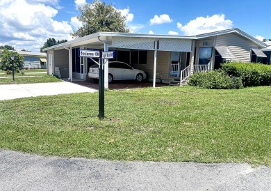 A corner lot home in a well-maintained, professionally managed on Lakes at Leesburg Golf Course in Florida - for sale on GolfHomes.com, golf home, golf lot