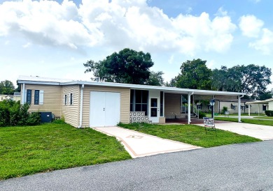 A corner lot home in a well-maintained, professionally managed on Lakes at Leesburg Golf Course in Florida - for sale on GolfHomes.com, golf home, golf lot