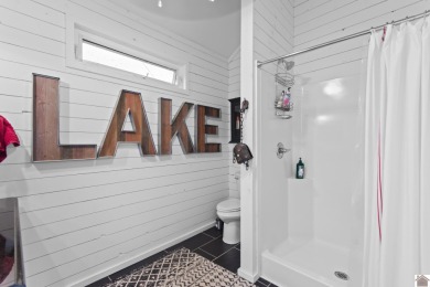 This private *WATERFRONT OASIS OVERLOOKING LAKE BARKLEY* awaits on Boots Randolph Golf Course in Kentucky - for sale on GolfHomes.com, golf home, golf lot