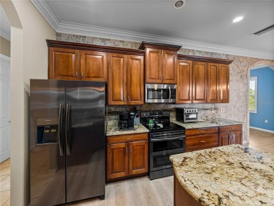 One or more photo(s) has been virtually staged. WATERFRONT on Lake Ashton Golf Club in Florida - for sale on GolfHomes.com, golf home, golf lot