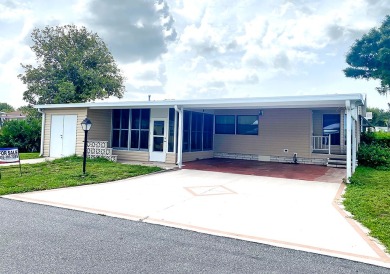 A corner lot home in a well-maintained, professionally managed on Lakes at Leesburg Golf Course in Florida - for sale on GolfHomes.com, golf home, golf lot