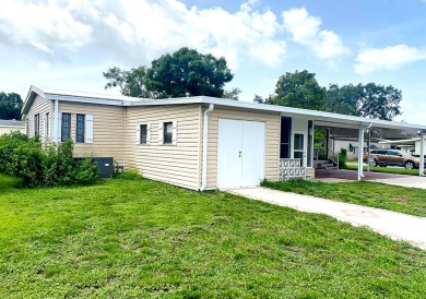 A corner lot home in a well-maintained, professionally managed on Lakes at Leesburg Golf Course in Florida - for sale on GolfHomes.com, golf home, golf lot