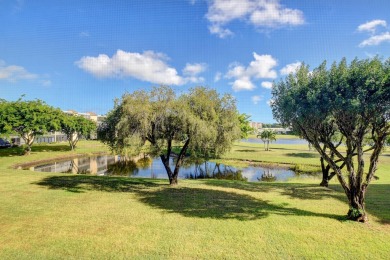 REMODELED GORGEOUS DOUBLE LAKE VIEW FROM 2ND FLOOR. NEW KITCHEN on Marina Lakes Golf Course in Florida - for sale on GolfHomes.com, golf home, golf lot