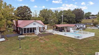 This private *WATERFRONT OASIS OVERLOOKING LAKE BARKLEY* awaits on Boots Randolph Golf Course in Kentucky - for sale on GolfHomes.com, golf home, golf lot