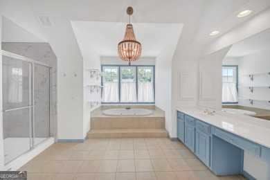 Welcome to this exquisite John Weiland-designed estate, where on Reunion Golf Club in Georgia - for sale on GolfHomes.com, golf home, golf lot